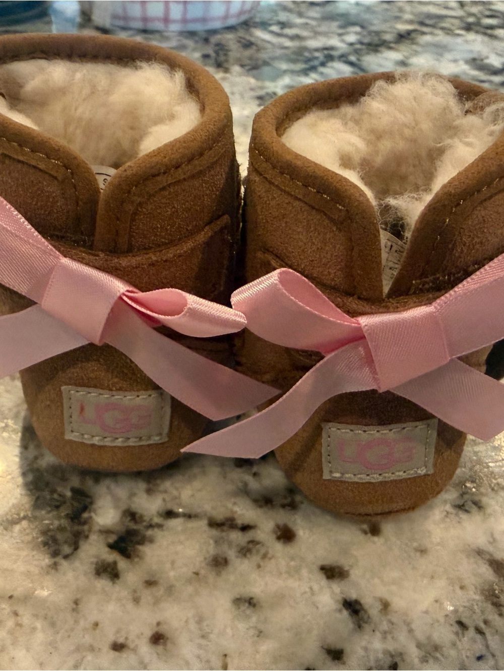 UGG Kids Chestnut Booties with Pink Ribbon Bows